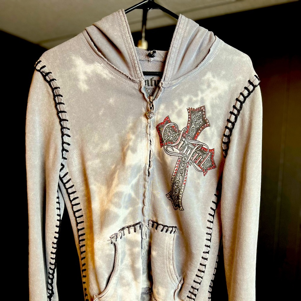 Women’s Zip-Up Hoodie by Sinful. Medium